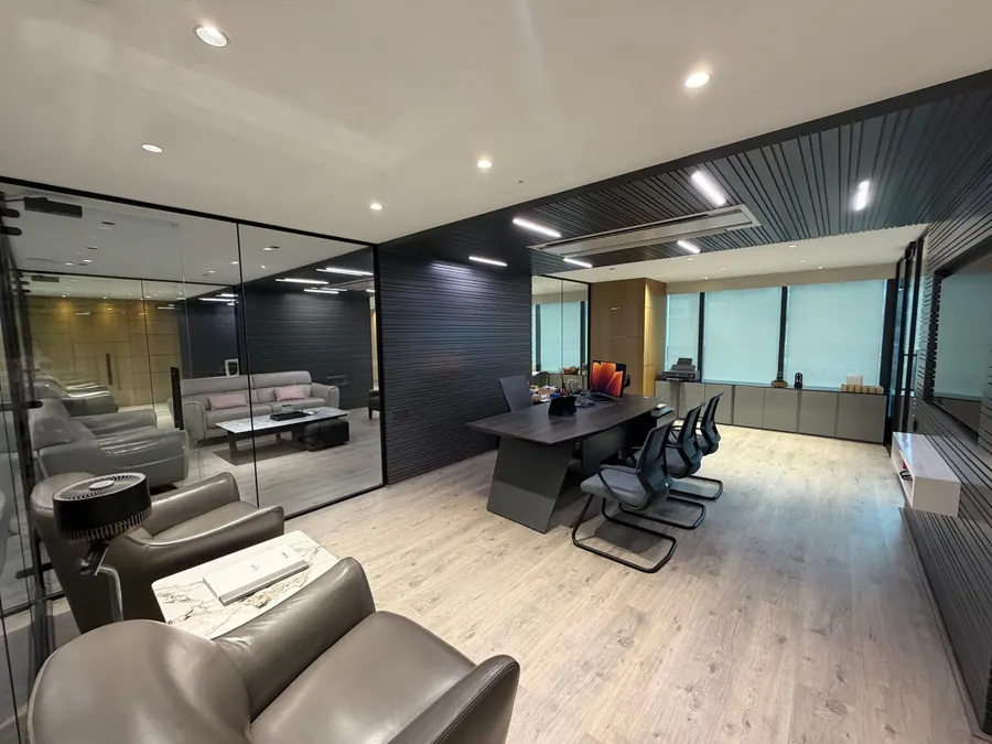 Manager's cabin with desk and visitor chairs at the Stone Hill office