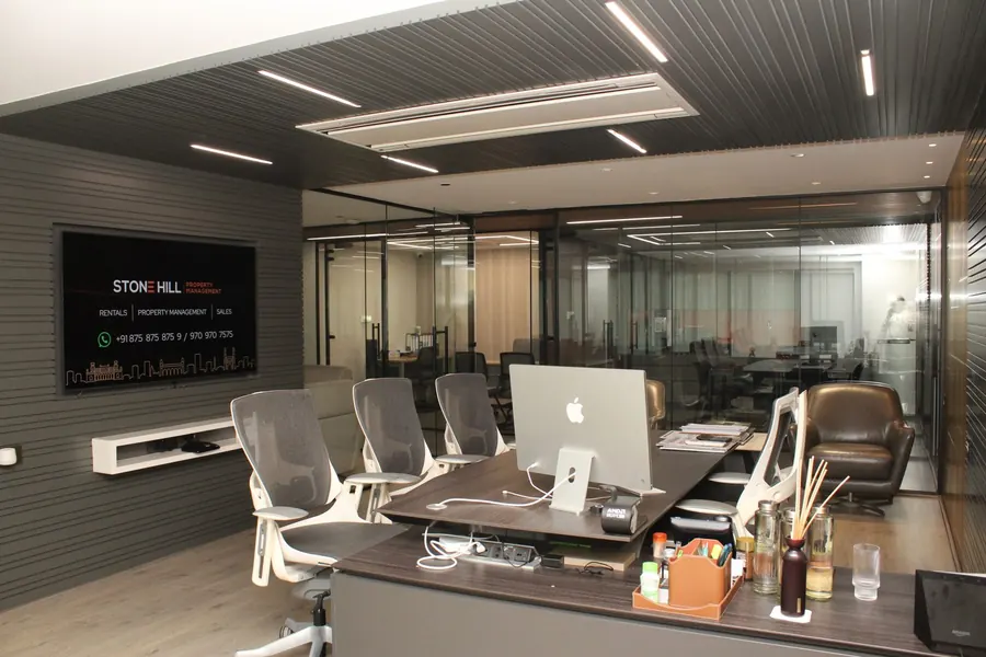Team workstations with the Stone Hill display screen at the Manikonda office