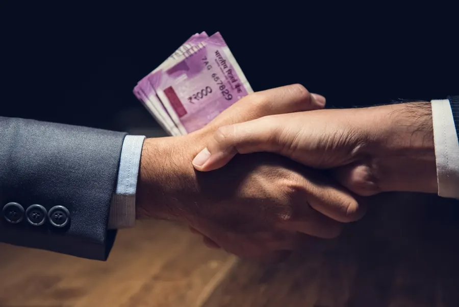 Handshake closing a property sale